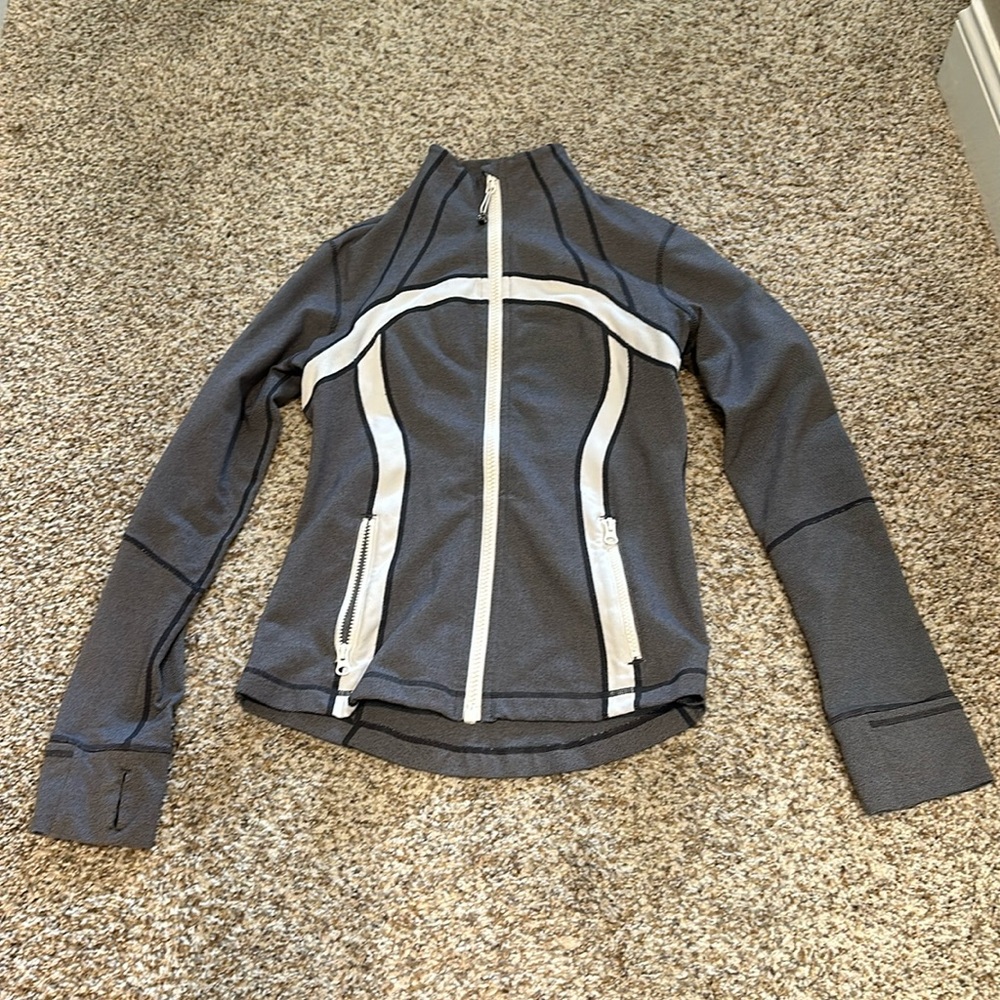 Lululemon define zip up.  Size 8.